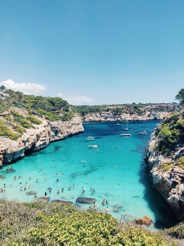 Caló des Moro, a narrow turquoise cove between cliffs