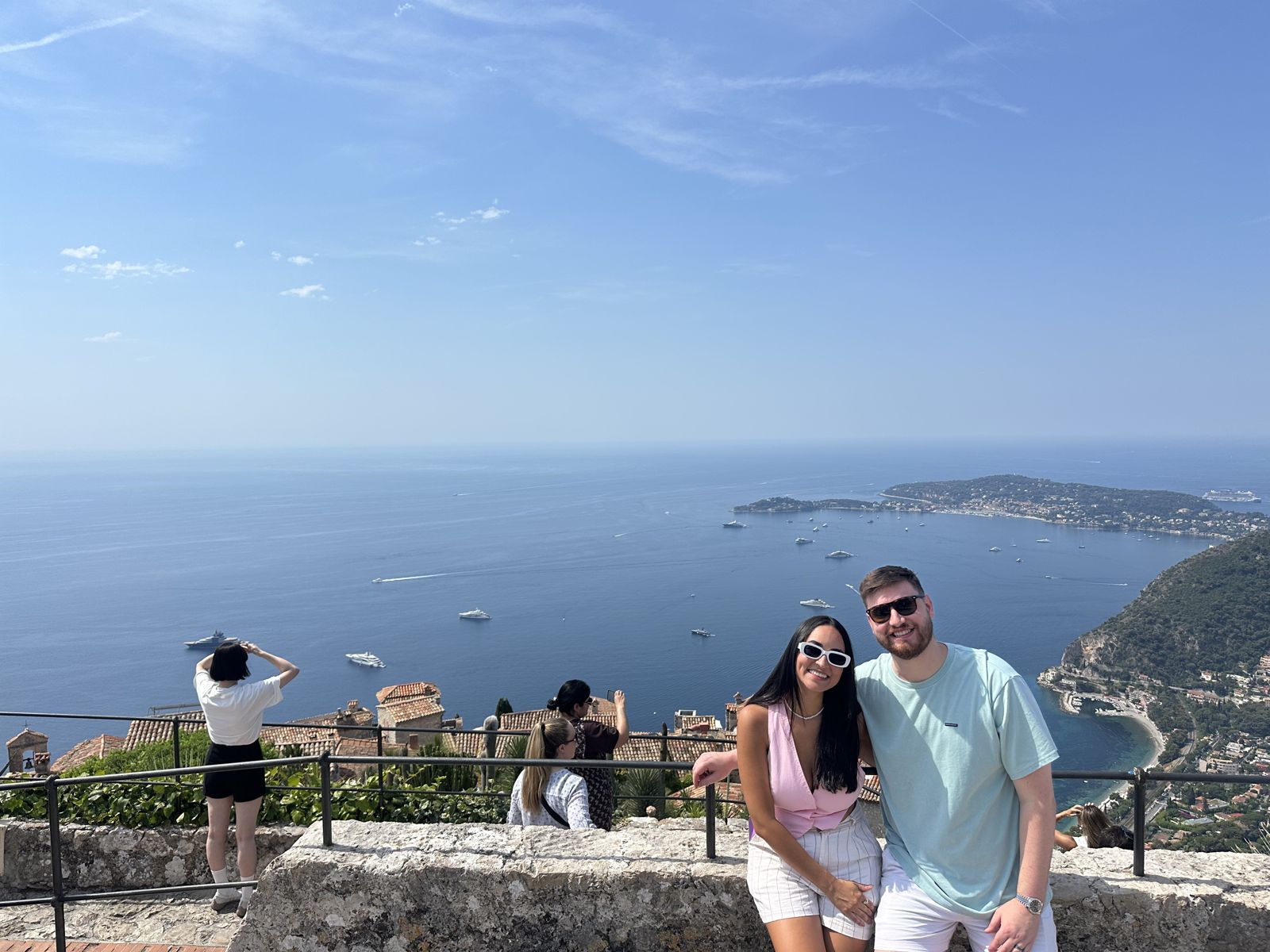 The couple at a viewpoint above the sea