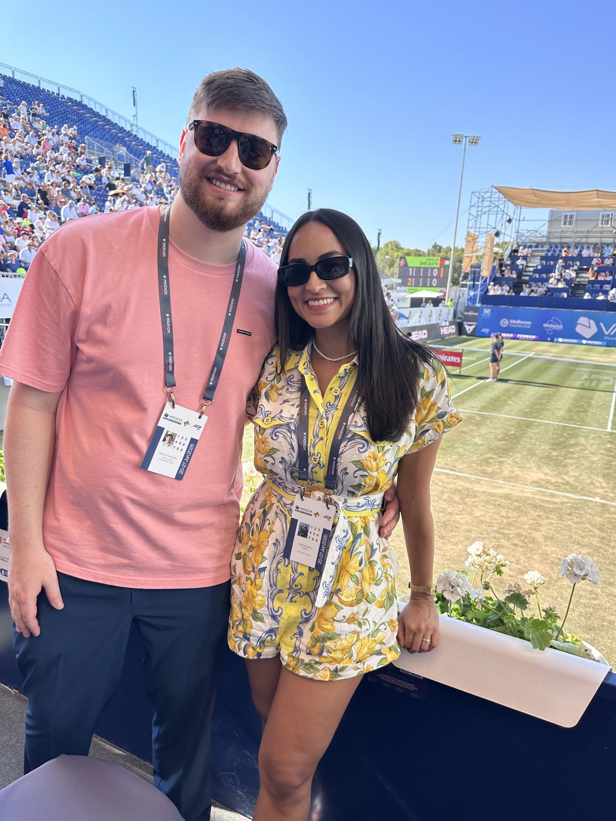 The couple at a grass-court tennis tournament